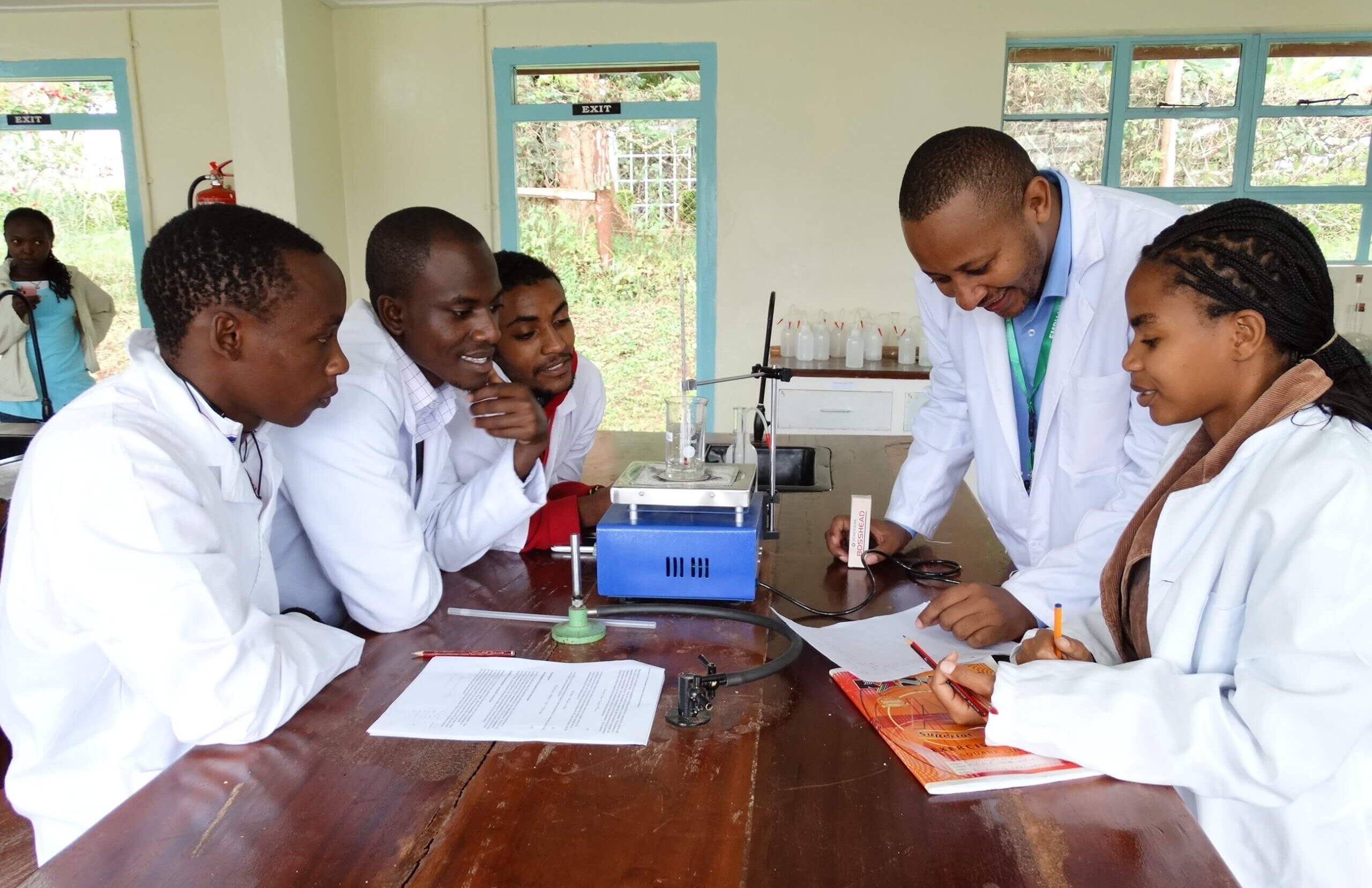 Professors and students in the lab at Embu University College